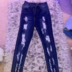 Fashion dark ripped jeans